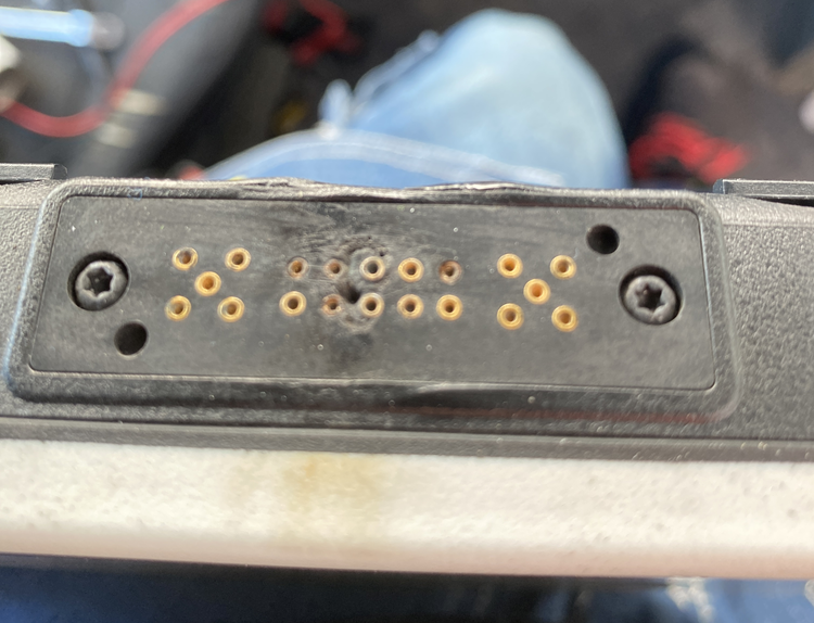 Technician repairing a tablet connector
